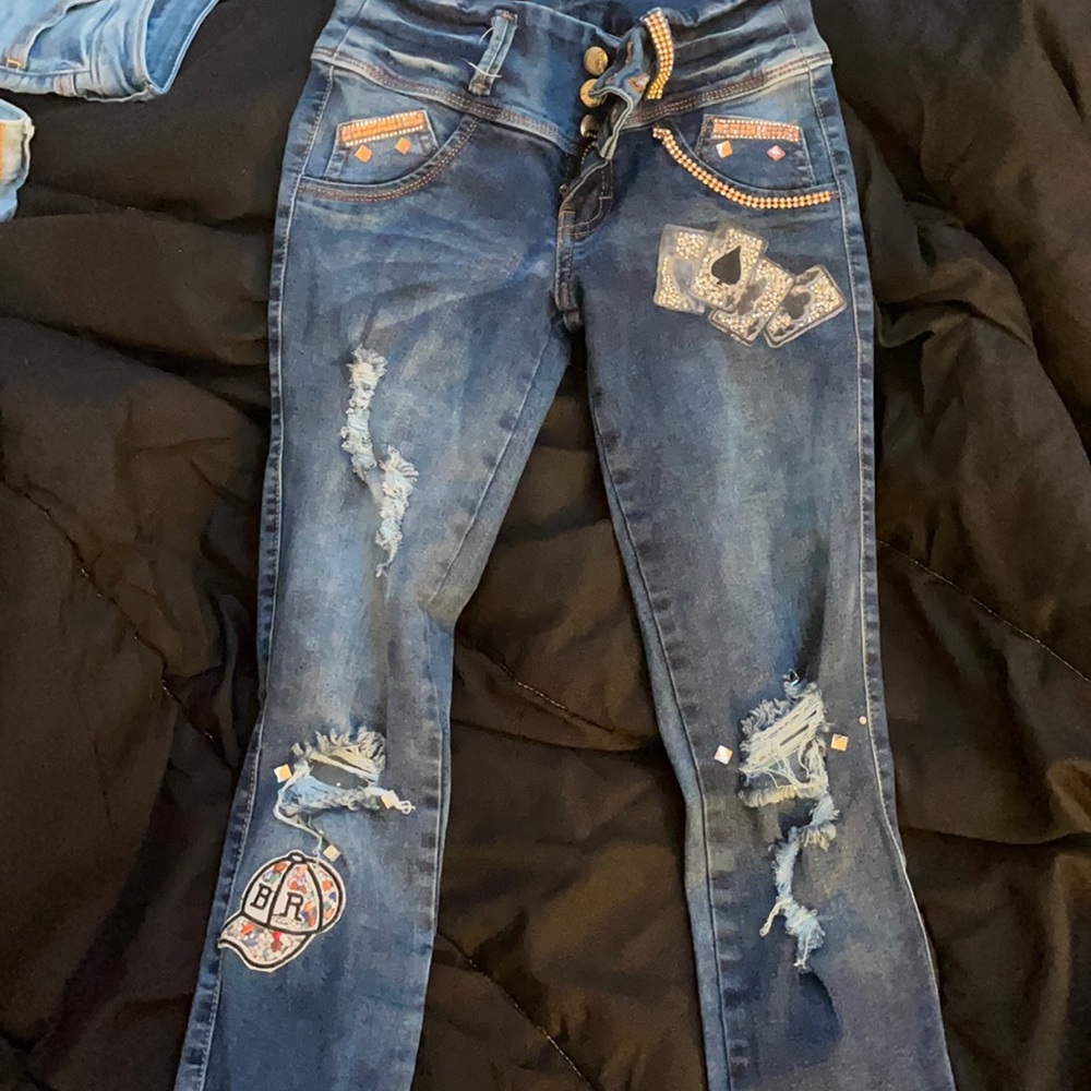 size 28 skinny low rise jeans with design